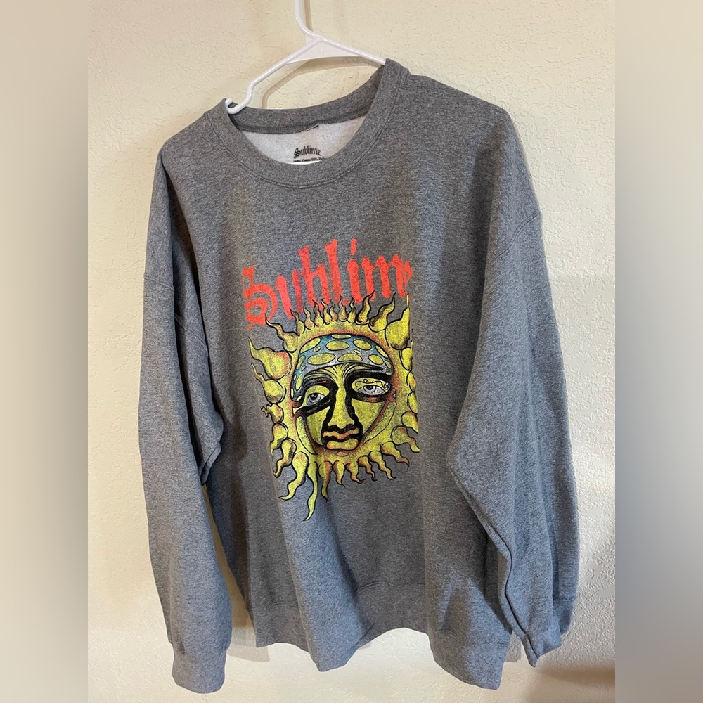 New w/tags grey sweatshirt with sublime sunface